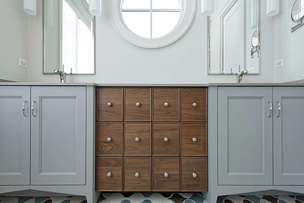 Arbor Mills custom bathroom vanity cabinetry with dark wood finish